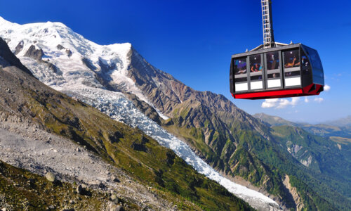 View of Mont Blanc and the Bossons glacier from the cable car going up to the Aiguille du Midi